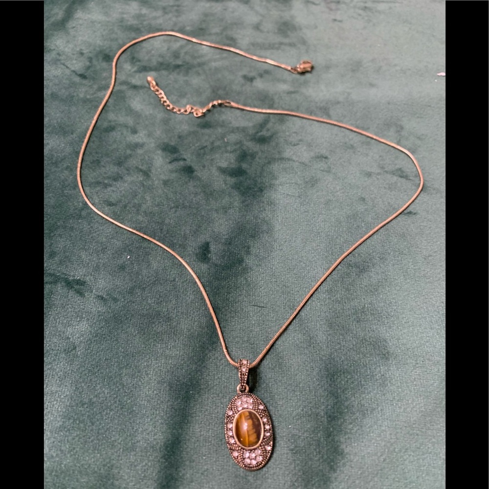 Gold necklace with brown stone